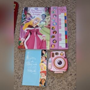 Set of Princess items, Piano book, Camera, activity book.